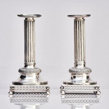 A pair of Swedish 18th century Gustavian silver candlesticks, marks of Arvid Floberg, Stockholm 1799.