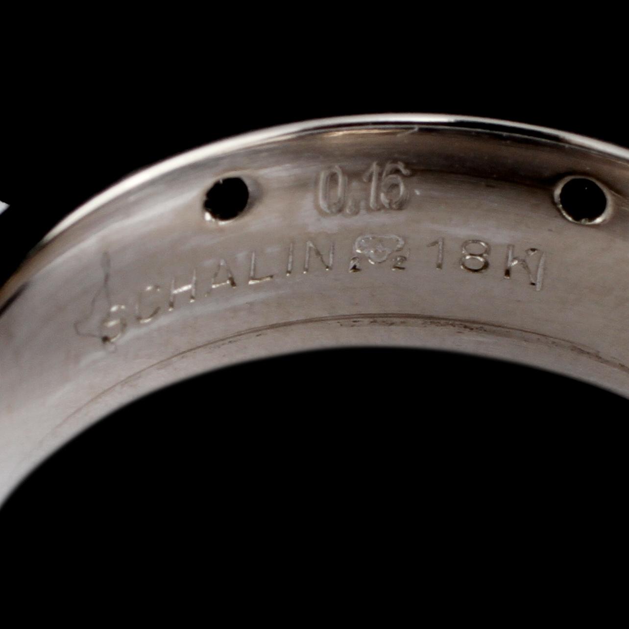 RING, 18k vitguld med 8 svarta briljantslipade diamanter, totalt 0.16 ct, Scahlins No1, Scahlins, Stockholm. Vikt 12 g.