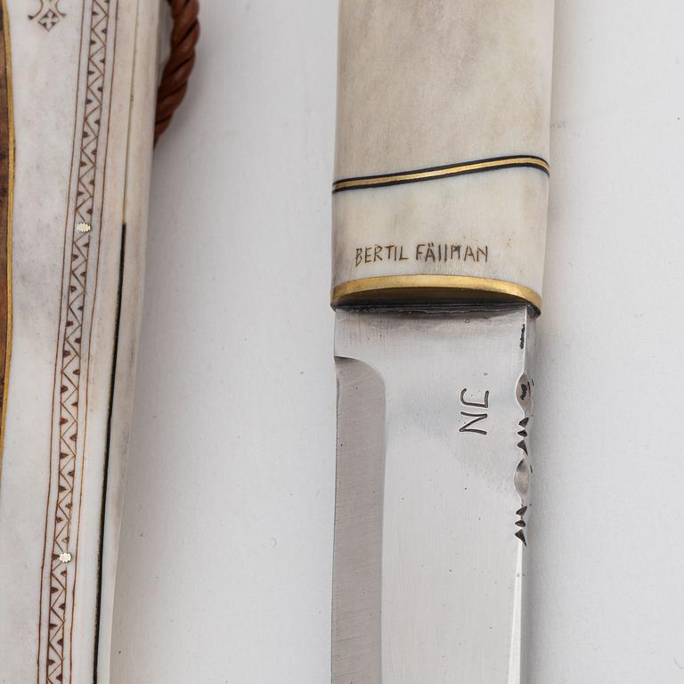 A reindeer horn knife by Bertil Fällman, signed.