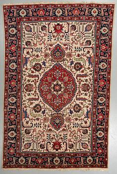 A CARPET, Old Tabriz, ca 300 x 198 cm.