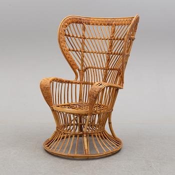 a rattan chair by Gio Ponti & Lio Carminati, Italy, second half of the 20th century.