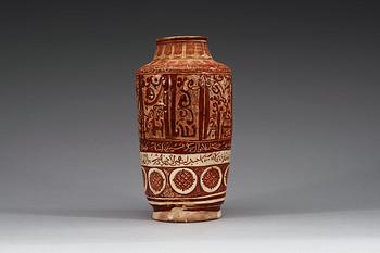 1174. A JAR, lustre-decorated pottery. Height 32 cm. Central Persia (Iran) 12-13th century. Kashan style.