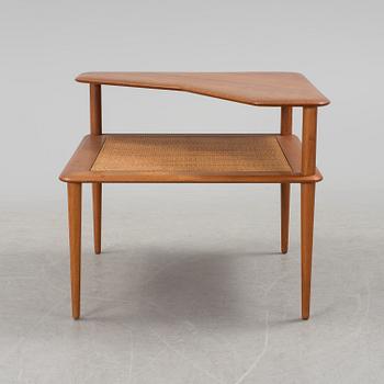 A teak table by Peter Hvidt & Orla Mølgaard Nielsen, France & Daverkosen.