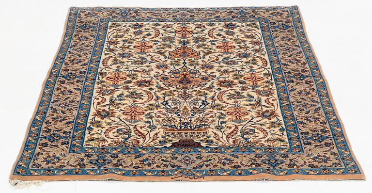 A rug, semi-antique, Esfahan, signed Ghena, ca 166 x 109 cm.