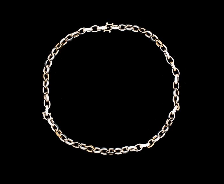 HALSKEDJA, 18 k guld samt vitguld med små briljantslipade diamanter ca 0.06 ct. Vikt ca 61 gram.