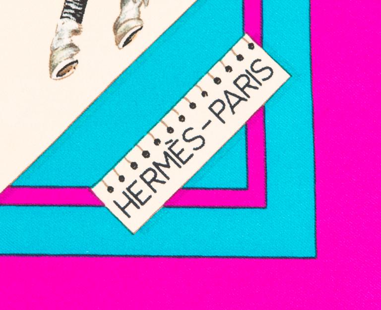 Hermès, a 'Hermès Cup Palm Beach' silk scarf.
