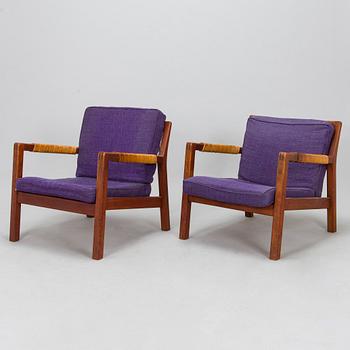 Carl Gustaf Hiort af Ornäs, A pair of mid-20th 'Rialto' open armchairs, Puunveisto Oy - Träsnideri Ab, Finland.
