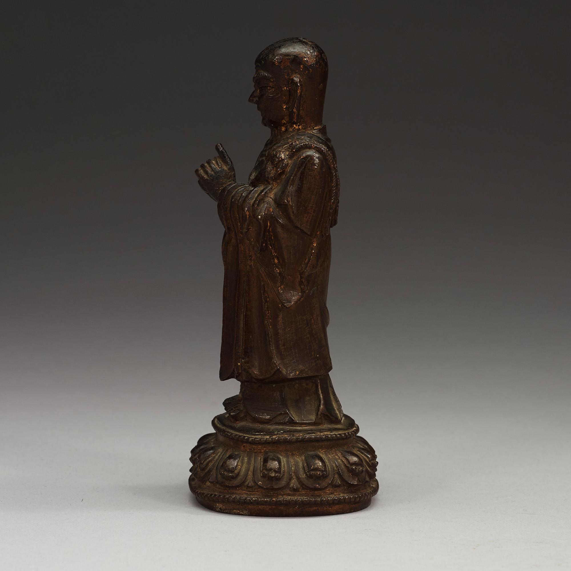 A bronze figure of a Lohan, Ming dynasty, 17th Century.