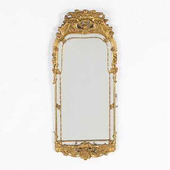 A Rococo style mirror, late 19th Century.