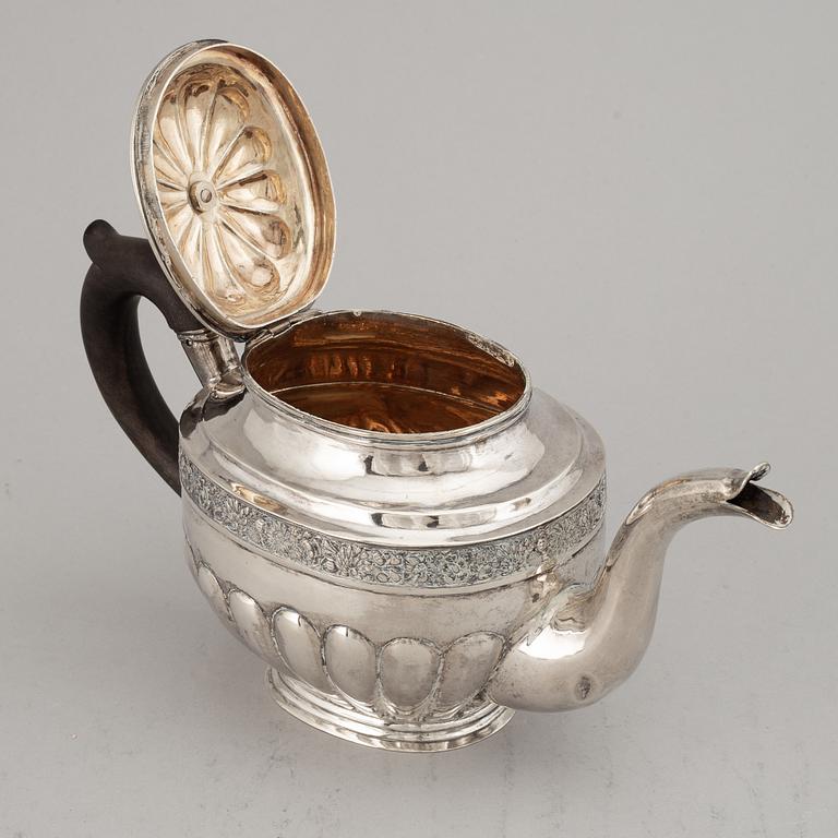 A Russian 19th century parcel-gilt silver tea-pot, marked Moscow 1833.