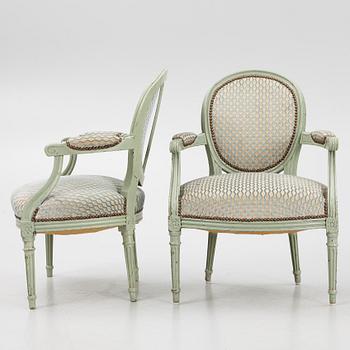 A pair of French Louis XVI open armchairs, late 18th century.