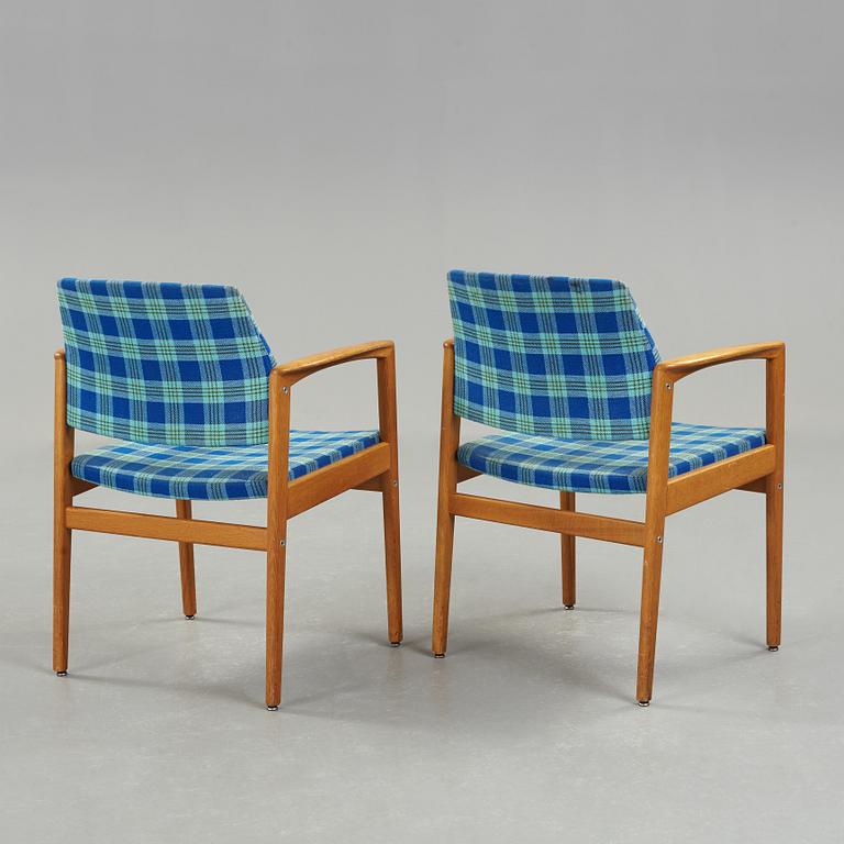 A pair of mid 20th century armchairs.