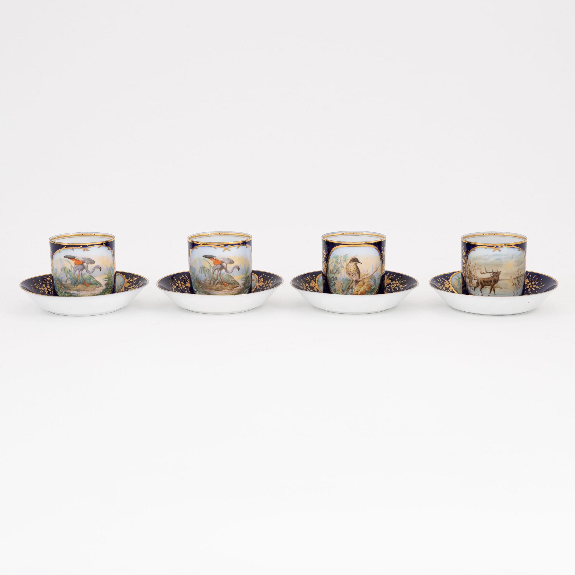 A set of four Russian cups with stands, Kuznetsov (1891-1917).