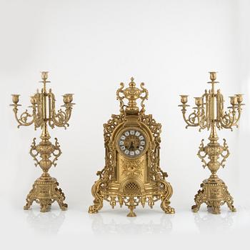 Table garniture, mantel clock, and two candelabras, Louis XV style, Lancini, Italy, second half of the 20th century.