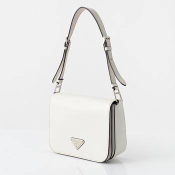 Prada, A white spazzolato leather bag.