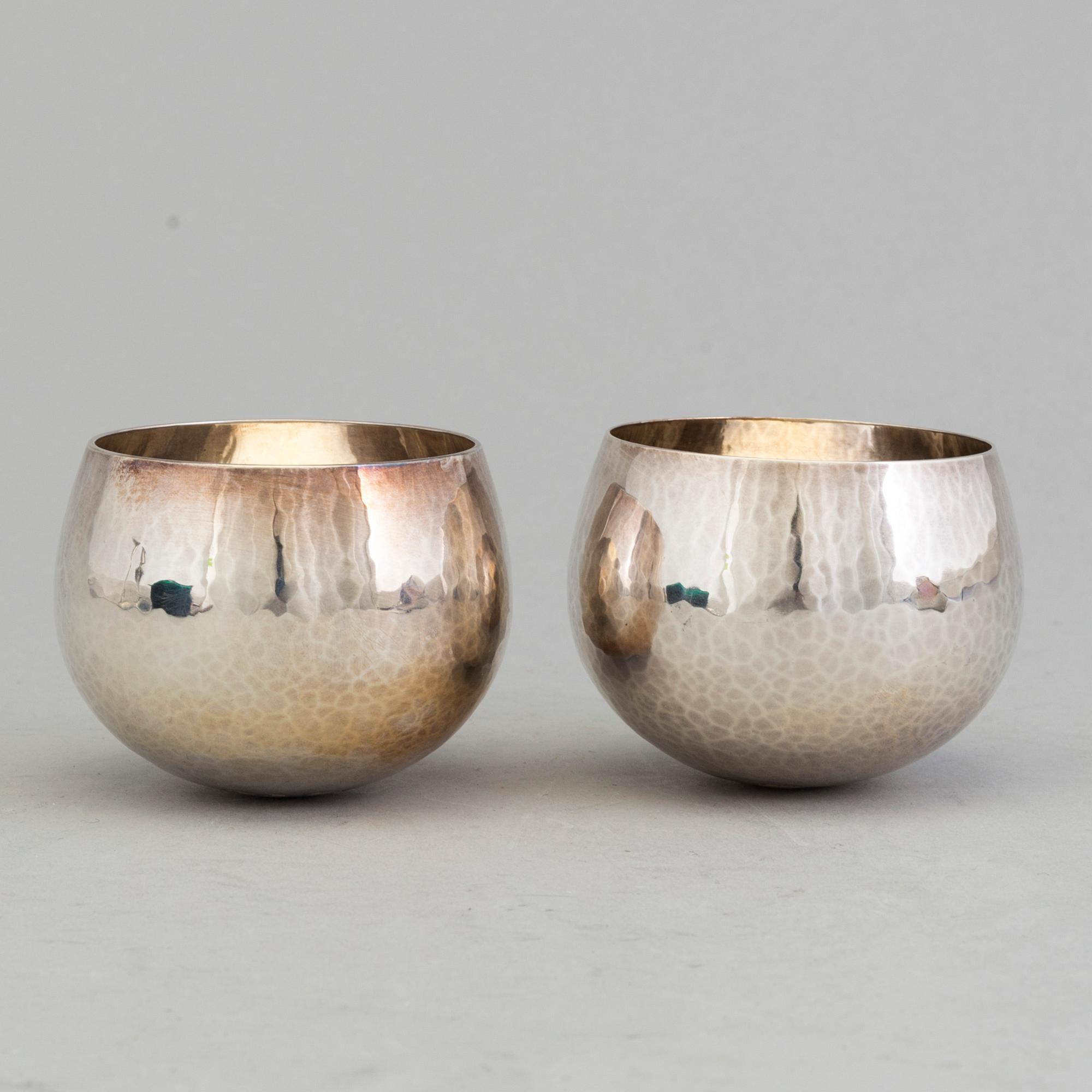 a pair of sterling silver cups by Karl-Axel Karlsson Stockholm 1989.