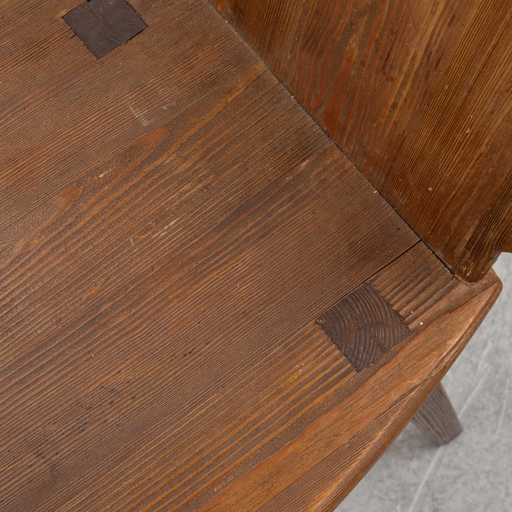 A set of four stained pine chairs, Sweden, 1930s-40s.