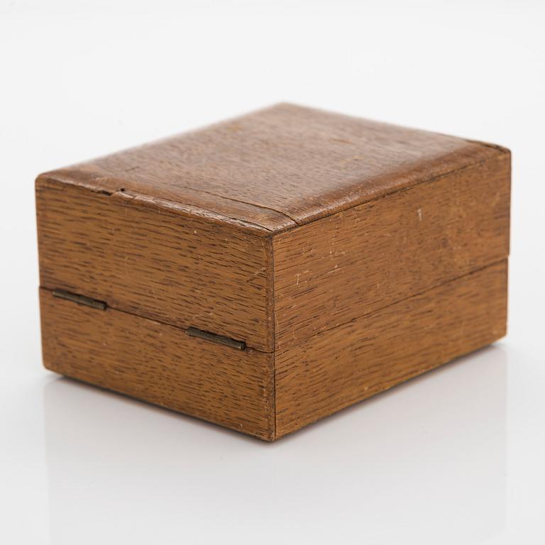 Alexander Fuld, a parcel-gilt beaker, Moscow 1895. In an oak case marked I.E. Morozov St. Petersburg.