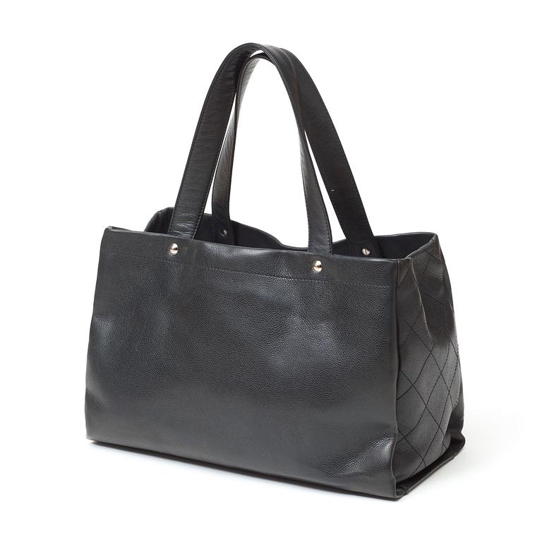 A black leather handbag by Chanel.