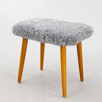 A sheepskin upholstered stool, second part of the 20th century.