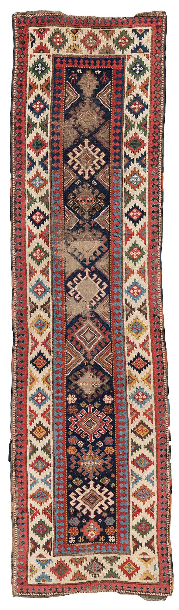 A Kazak runner, Southwest Caucasus, c. 375 x 98 cm.