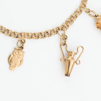 Armband, 18K guld, med berlocker.
