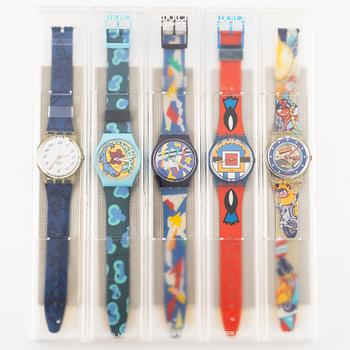 Parti med 21 Swatch-klockor, gummiband och klocklitteratur, "No Reserve".