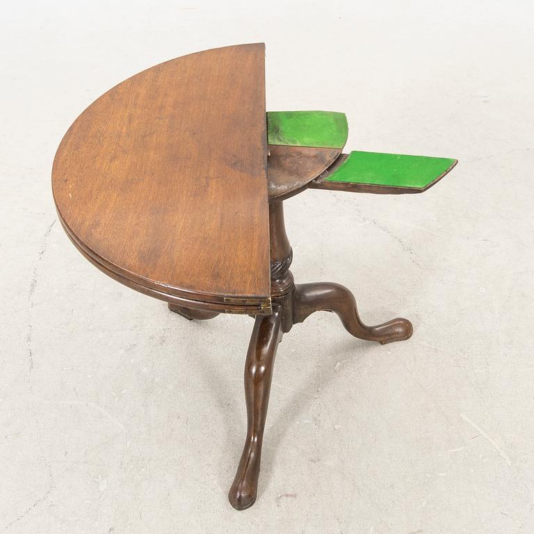 An English Queen Anne mahogany folding table 18th century.