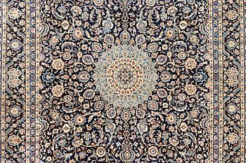 A Keshan carpet, c. 392 x 290 cm.