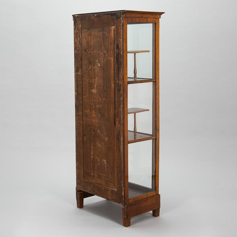 A mid-19th-century vitrine cabinet, possibly from the Baltics.