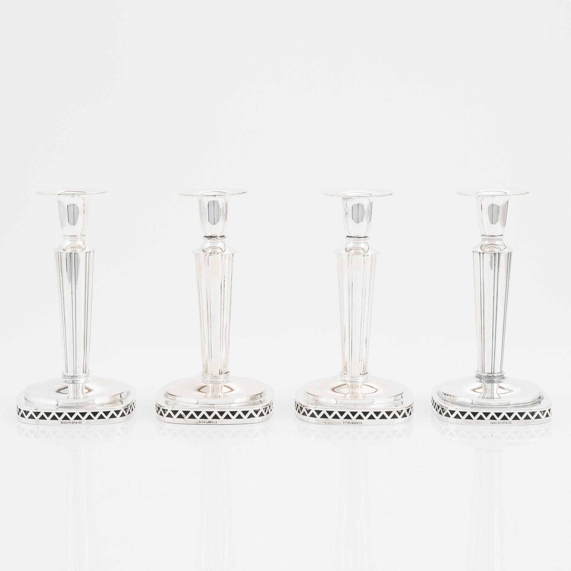 A set of four silver candlesticks by  Tesi, 1955-59.