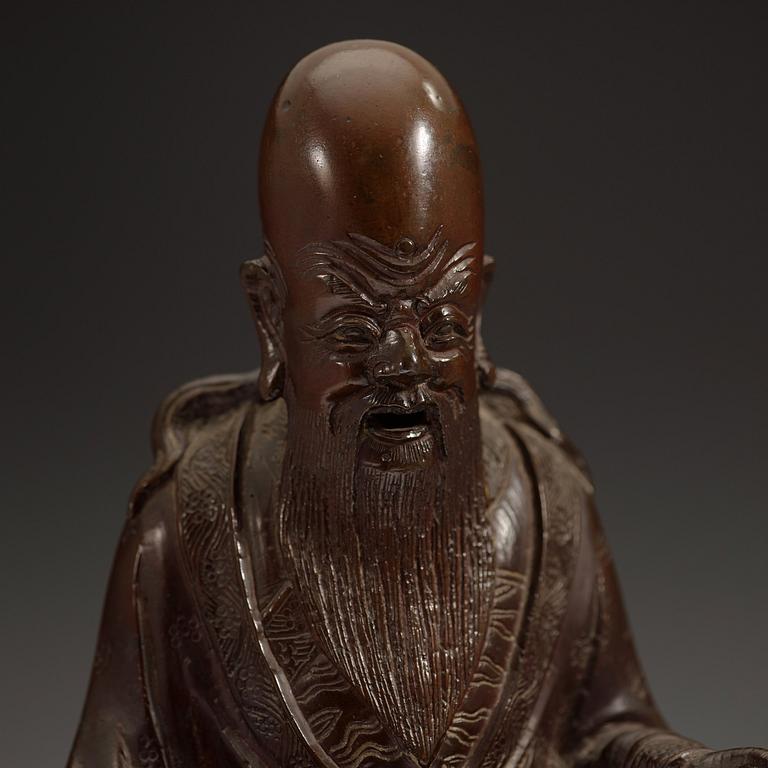 A bronze figure of Sholao, late Qing dynasty (1644-1912).