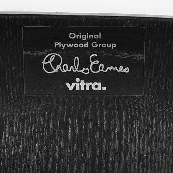 Charles & Ray Eames, a pair of "DCM" chairs, Vitra, 1997.