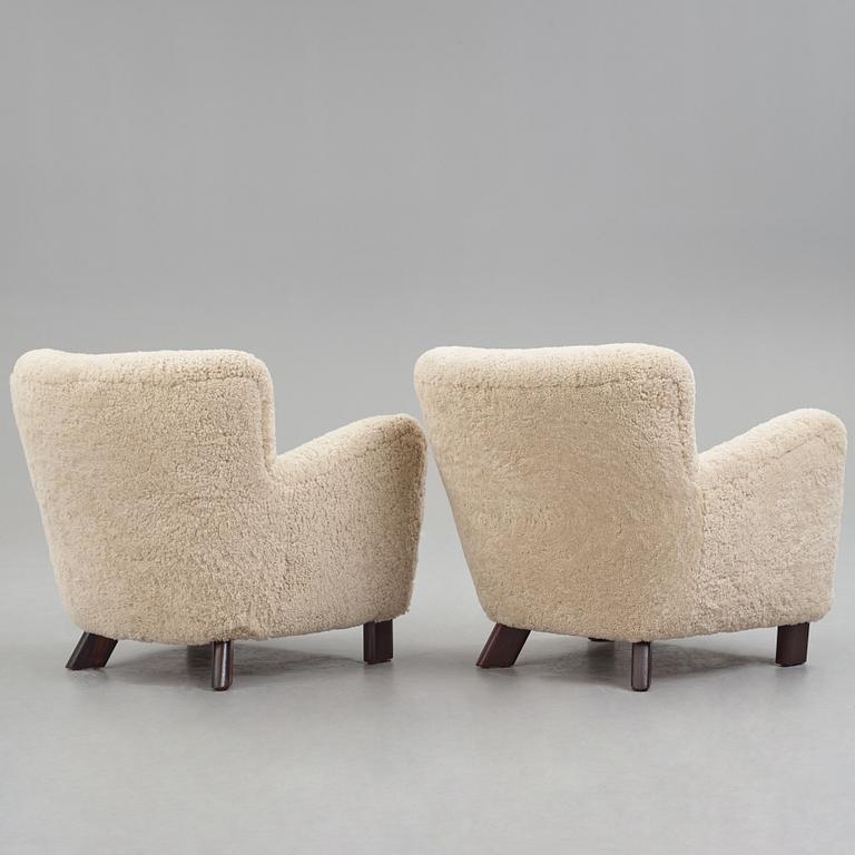Fritz Hansen, a pair of "1669", easy chairs for Fritz Hansen, Denmark 1940's.