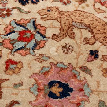 An antique Benlian Tabriz carpet, signed Jabarzade, ca 365 x 270 cm.