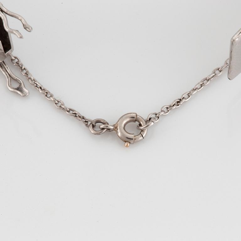 A platinum bracelet set with old- and eight-cut diamonds.
