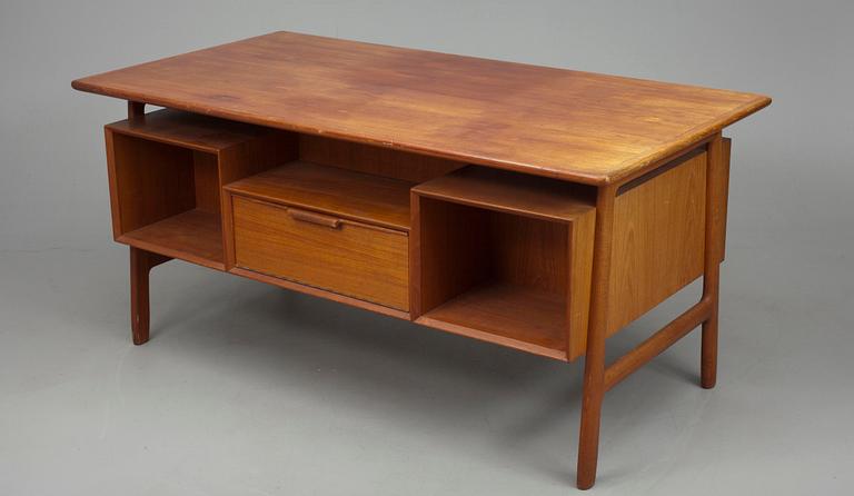 KIRJOITUSPÖYTÄ, tiikkiä, todenn. Tanska 1900-luvun loppupuoli.