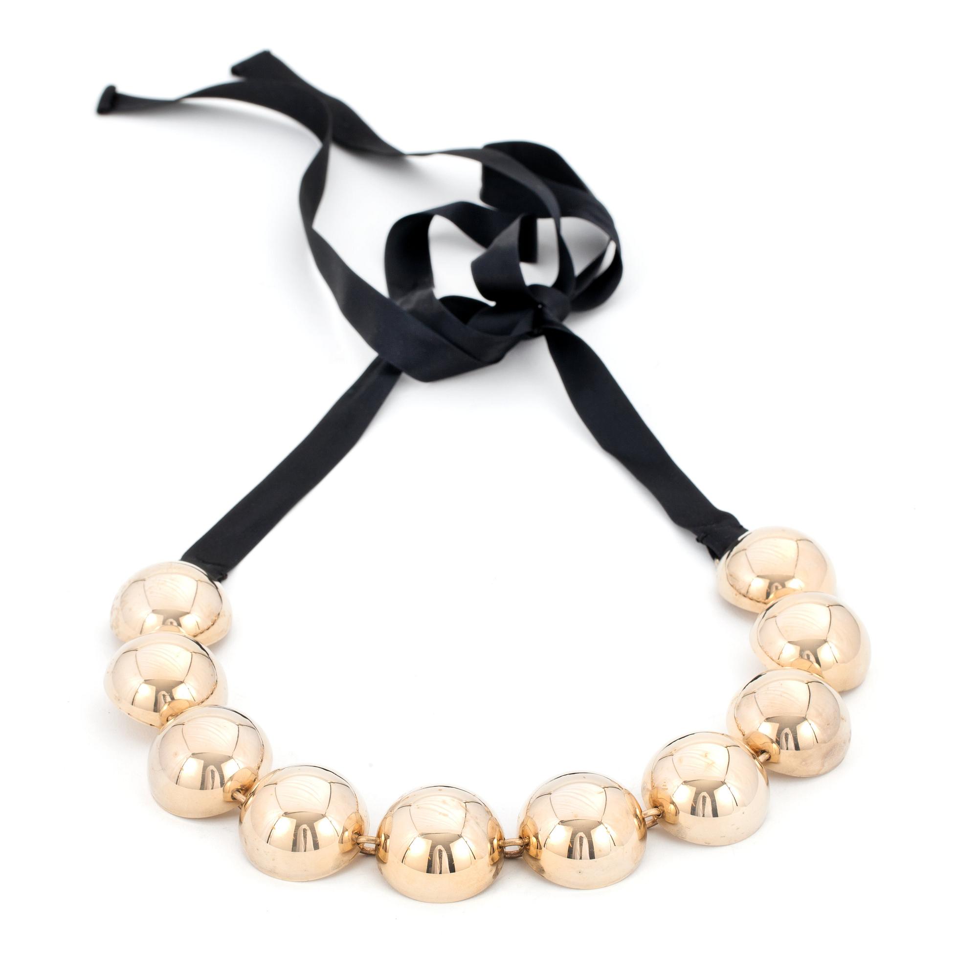 MARNI, a metal and silk necklace.