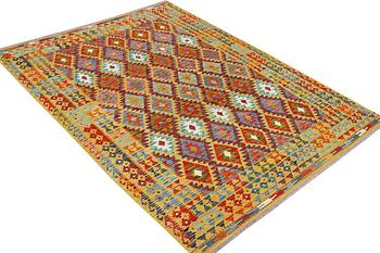 A Kilim rug, c. 240 x 181 cm.