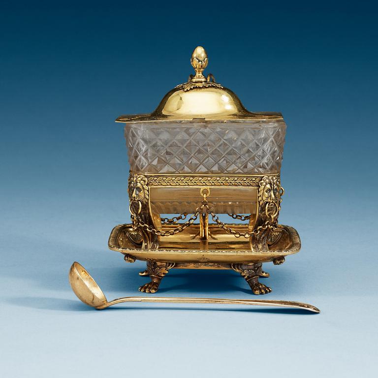 A Swedish 19th century silver-gilt and glas mustard-jug, makers mark of Gustaf Folcker, Stockholm 1835.