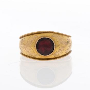 A RING, 18K gold, red glass. Fredrik Tiander, Loviisa Finland 1823-1869.