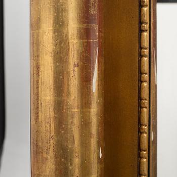 A 19th and 20th century empire baldaquin.