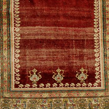 A rug, an antique Anatolia, probably Gördes (Ghiordes), a prayer rug, ca ca 188 x 124 cm.
