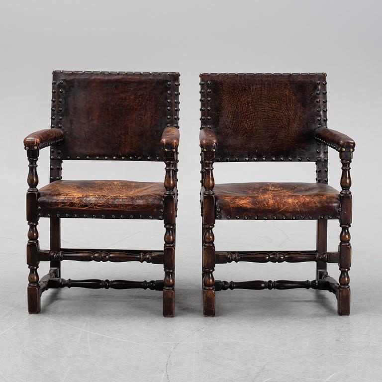 A pair of baroque style armchairs, first half of the 20th century.