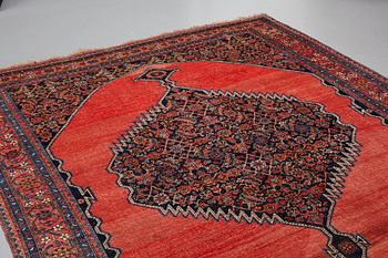 A CARPET, an antique Bidjar kelly, ca 587 x 230 cm.