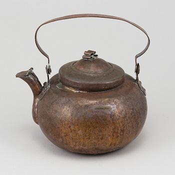 An 18th century copper coffee pan.