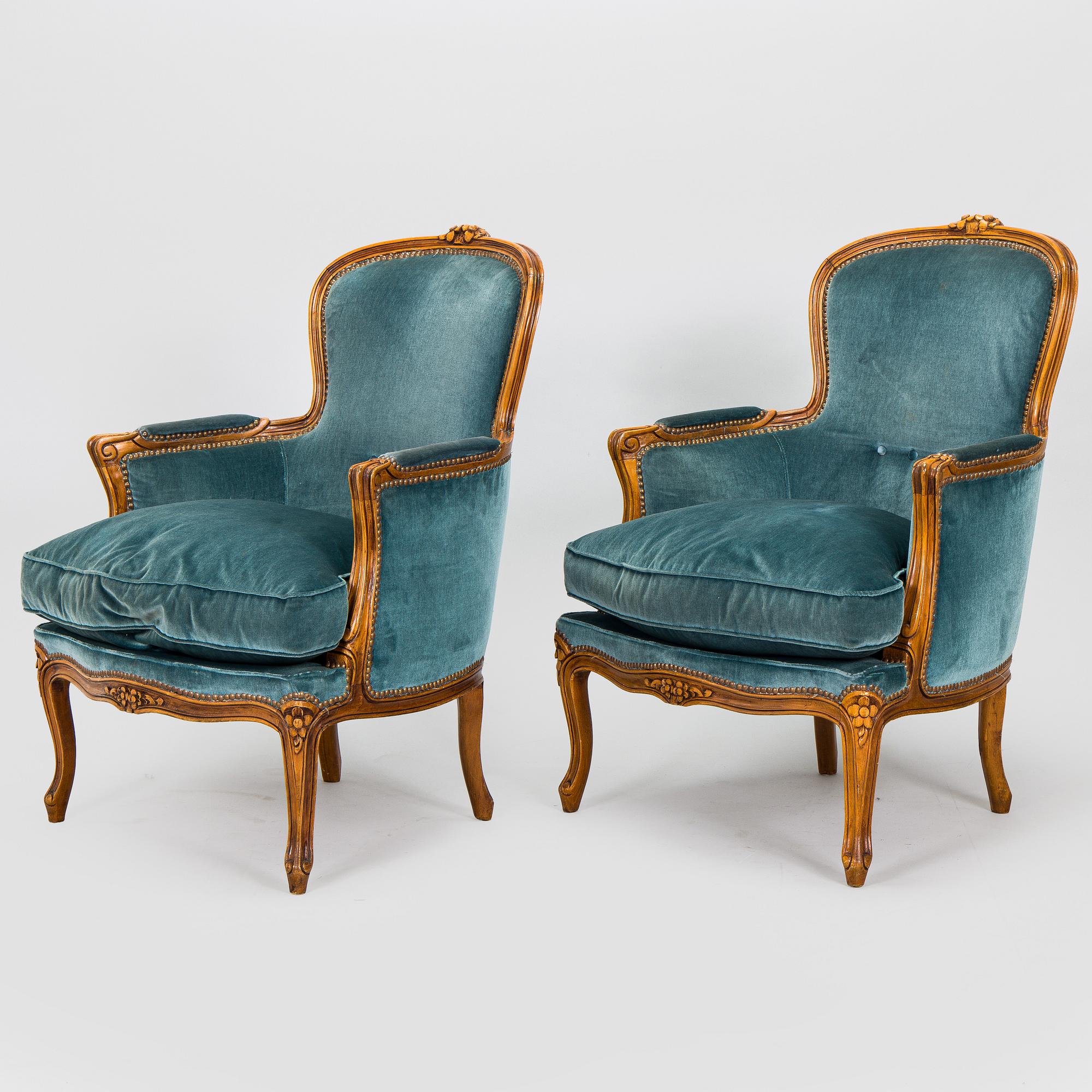 A pair of Louis XV style armchairs, mid-20th century.