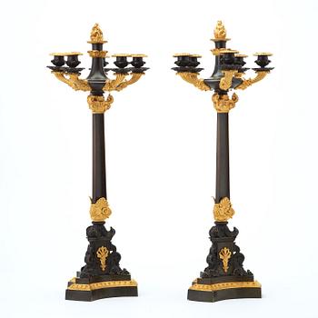 A pair of French 1830/1840's late Empire six-light candelabra.