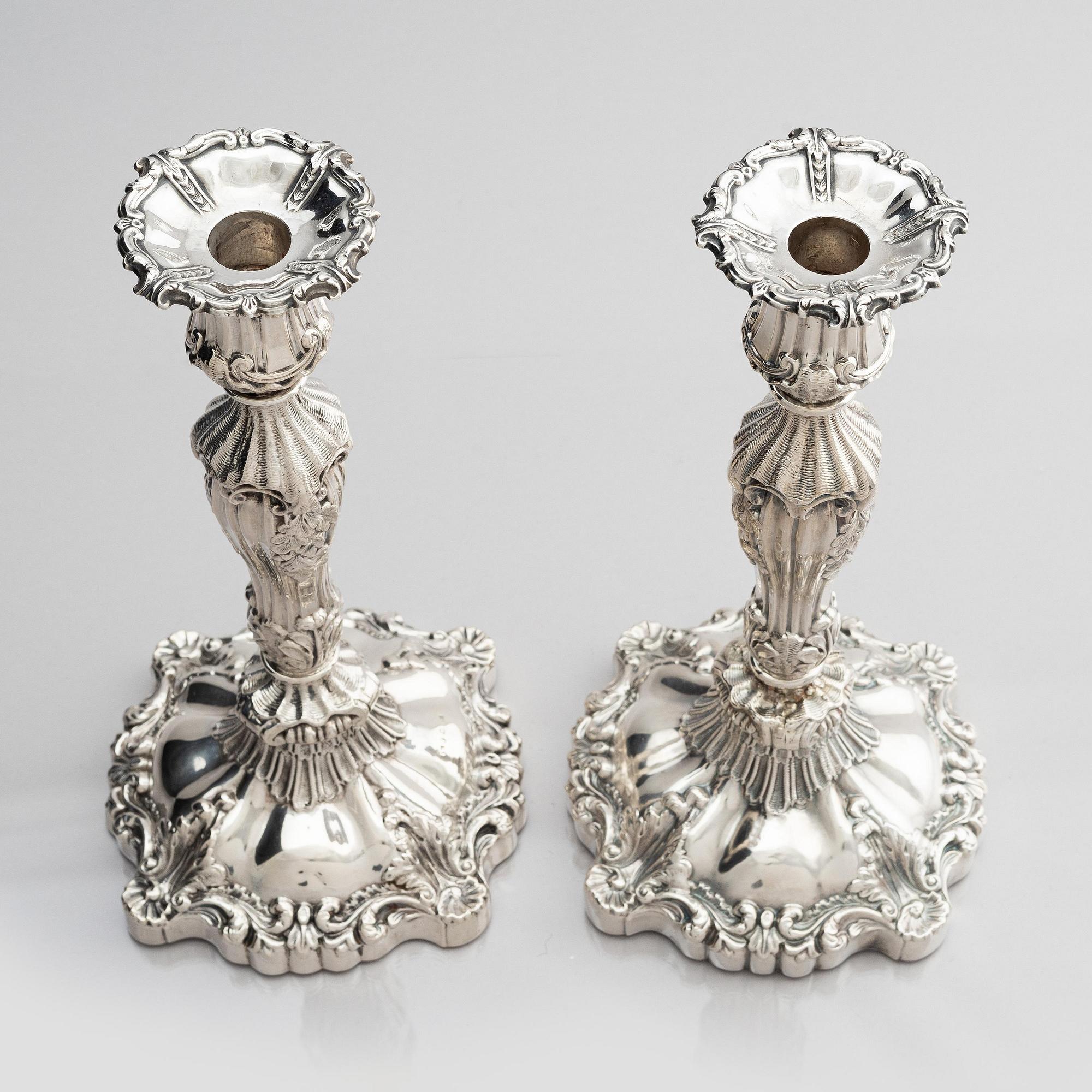 A pair of silver candlesticks, marks Gustaf Möllenborg, Stockholm 1845.