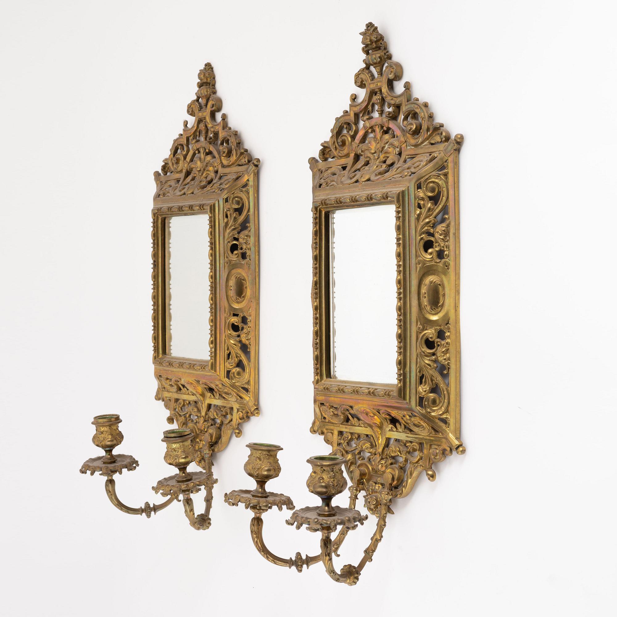 A pair of metal mirror sconces, first half of the 20th century.